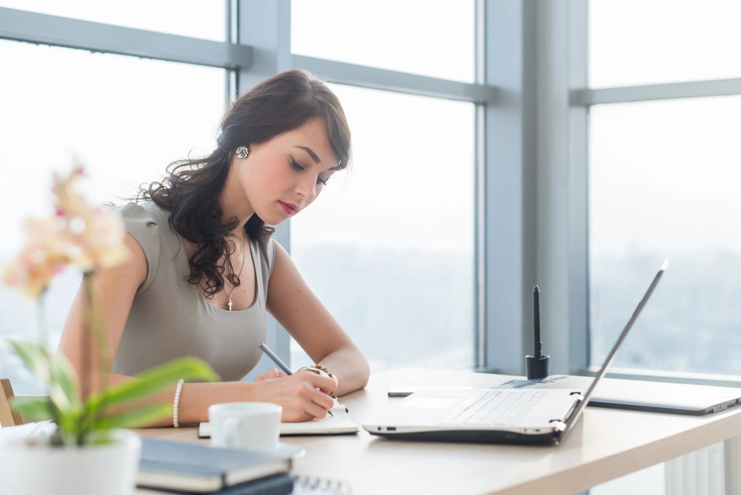 Woman Writing a Eulogy